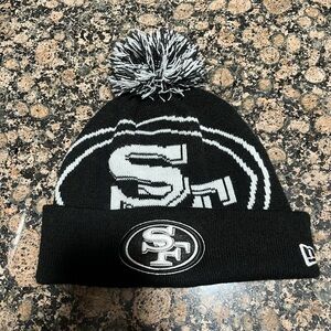 New Era Black and White Adult Pom Beanie - SF Niners